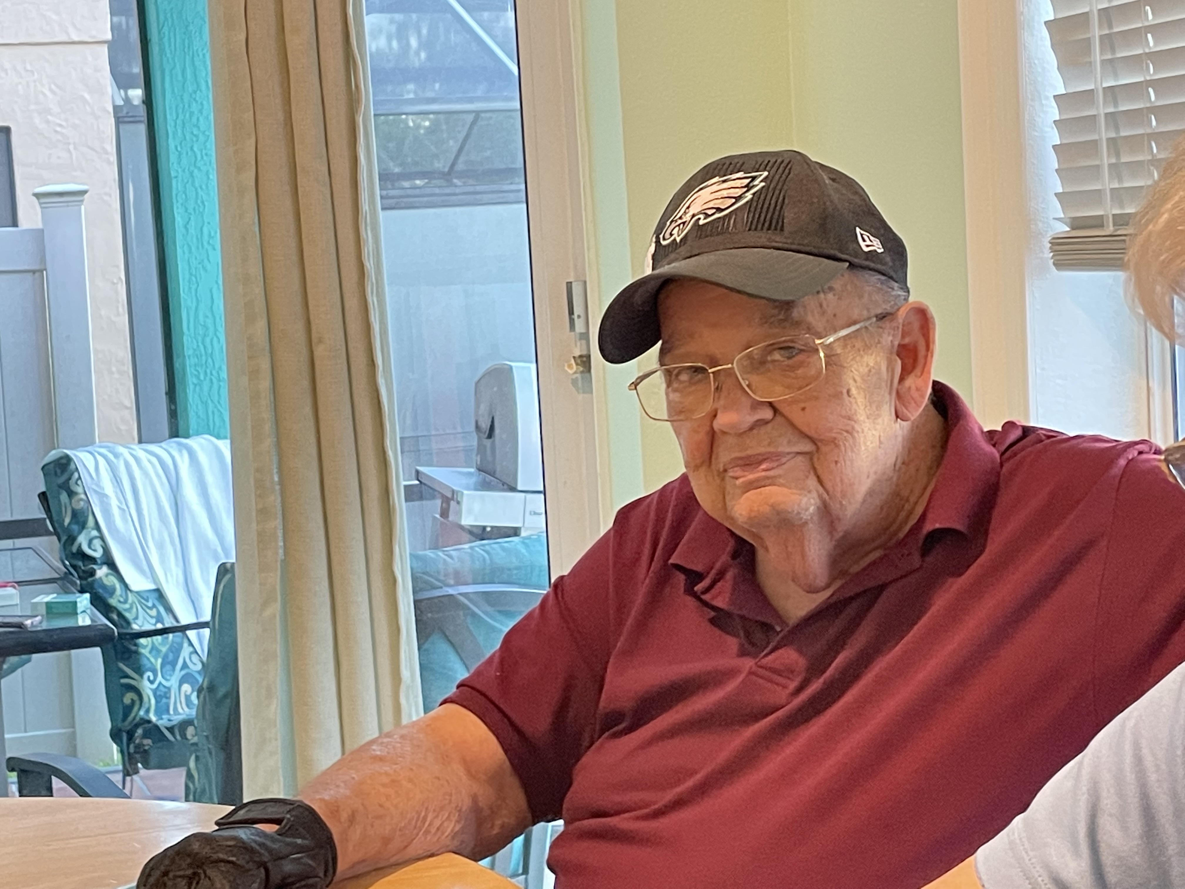 Jay Hadly seated at home