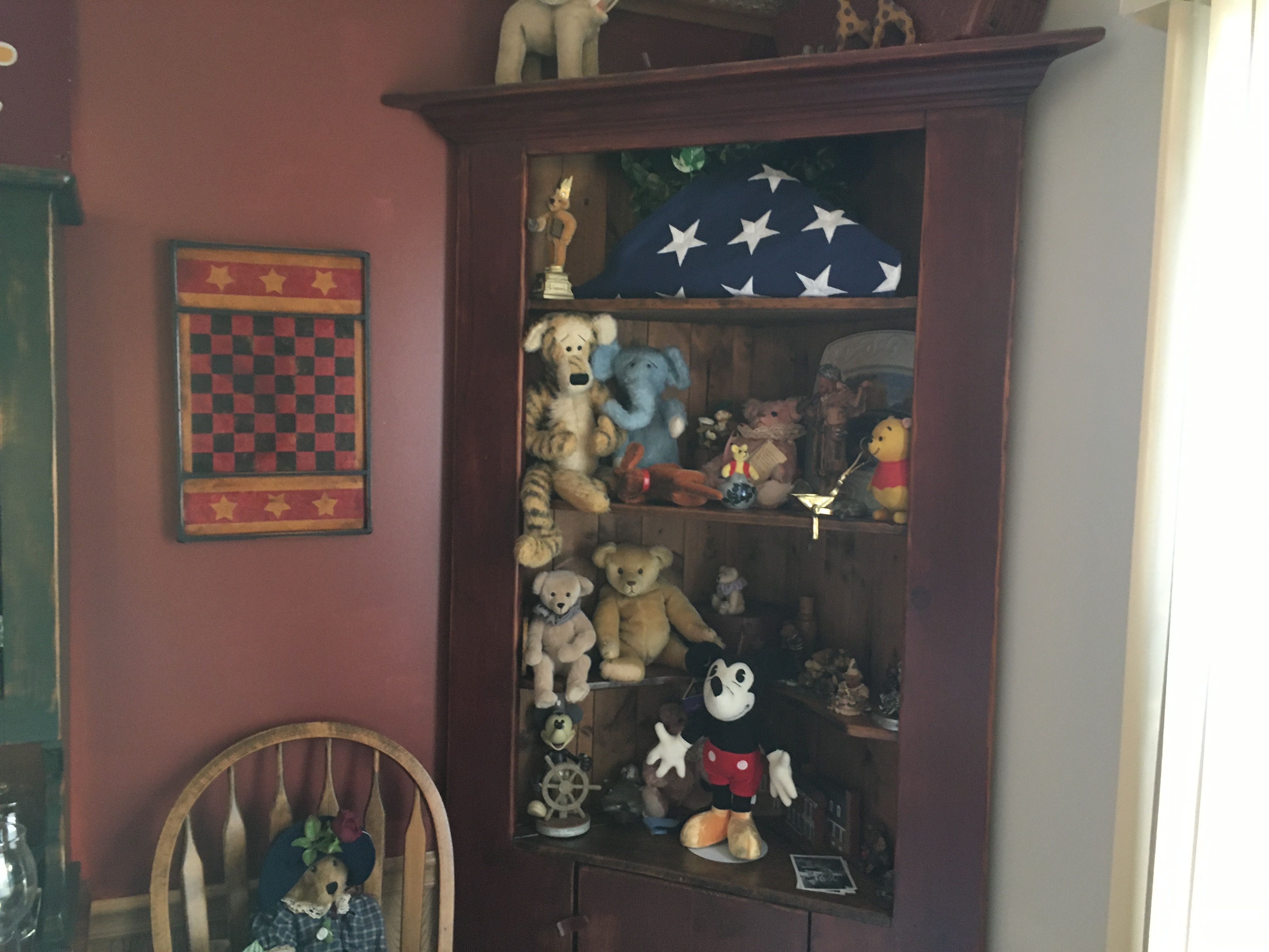 Display cabinet filled with collectible bears